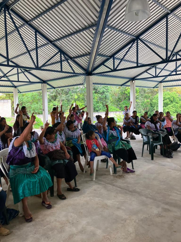 women from the community participate in an assemblea of the coop